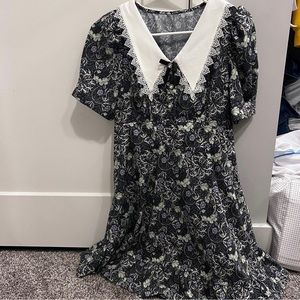 A dress with a flower pattern.
